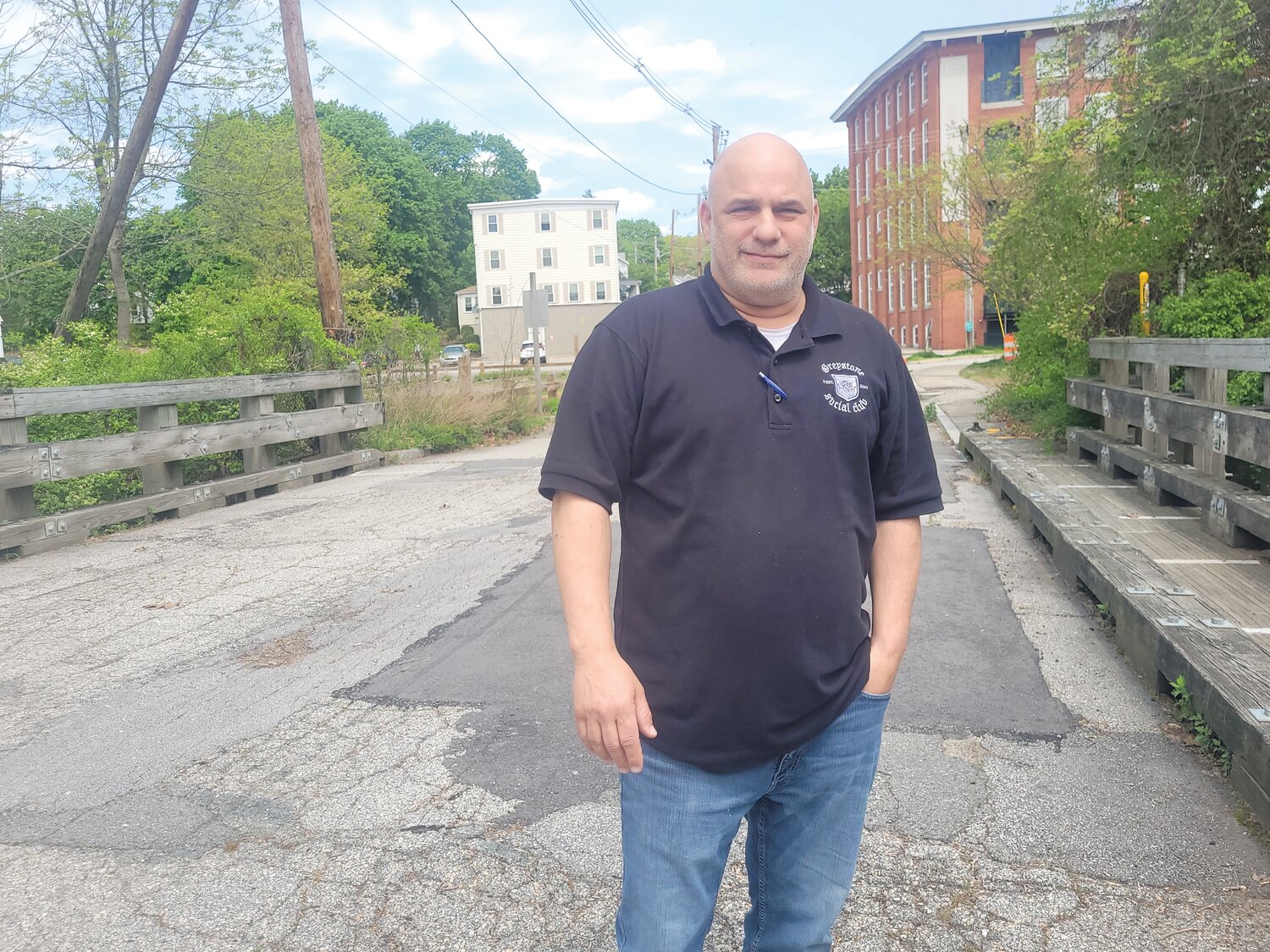 HEART OF GRANITEVILLE: Chris Gosetti, President of the Greystone Social Club, has been urging elected leaders in Johnston and North Providence to join efforts to reopen the Greystone Sluiceway Bridge which has been closed since 2020.